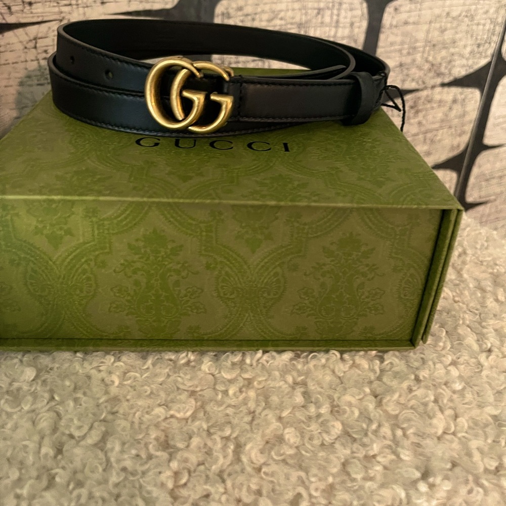 Authentic new with tags Leather Gucci belt. Never worn because to big for me.